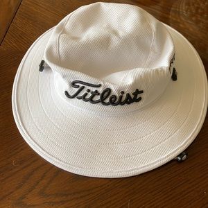 Barely worn Titleist wide brimmed hat. I don’t wear it anymore.
